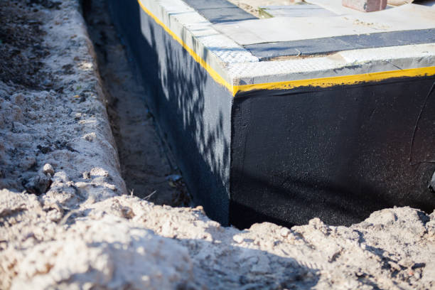 Professional Waterproofing technician working in Cable, OH